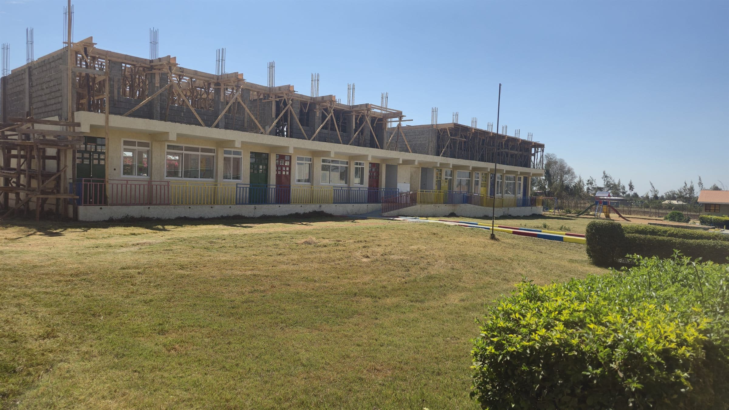 Construction underway on a new multi-storey classroom block at Oak Leaf Academy, expanding the school's facilities.